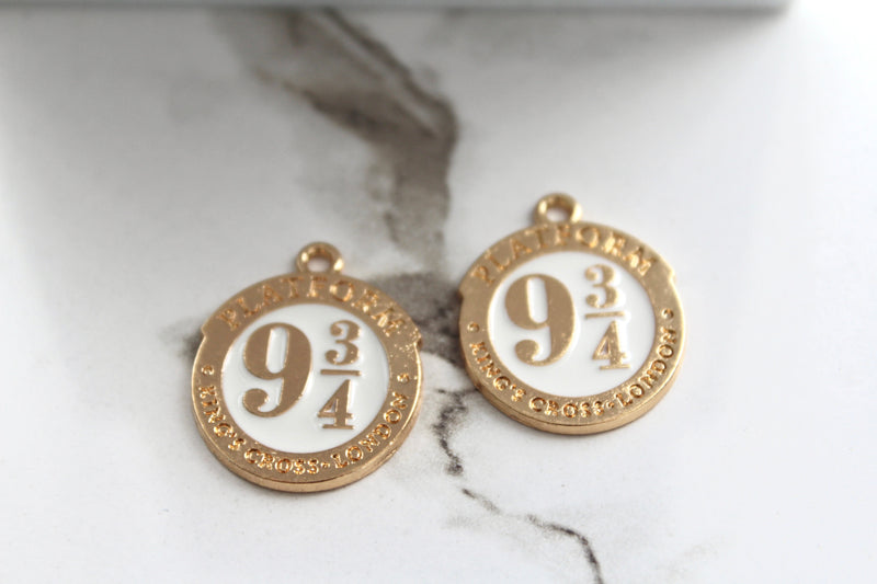 Load image into Gallery viewer, Platform 9 3/4 Charm - Gold Plated
