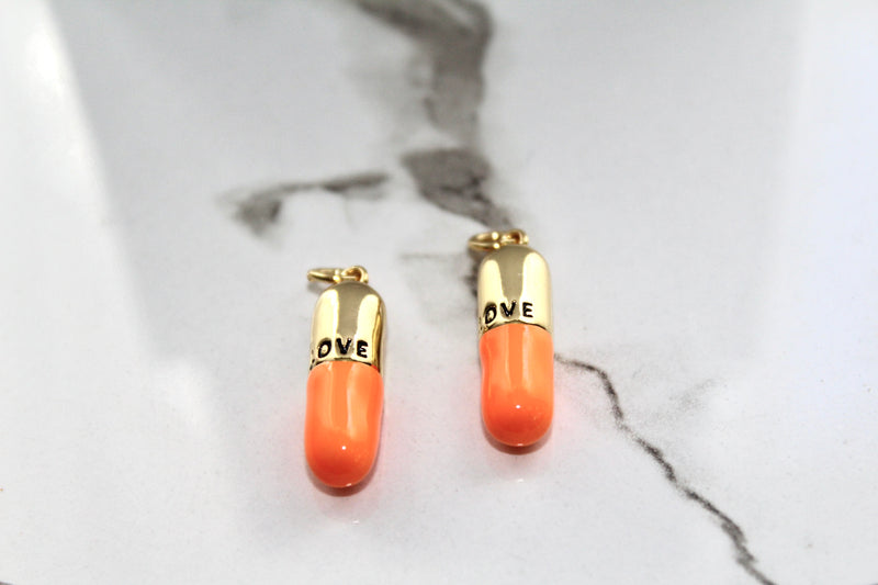 Load image into Gallery viewer, Orange Pill Charm - Gold Plated
