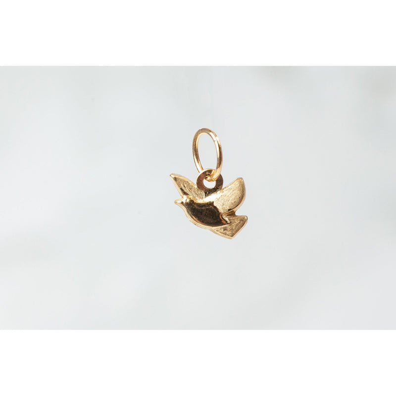 Load image into Gallery viewer, 7mm 14k Yellow Gold Dove Bird Charm
