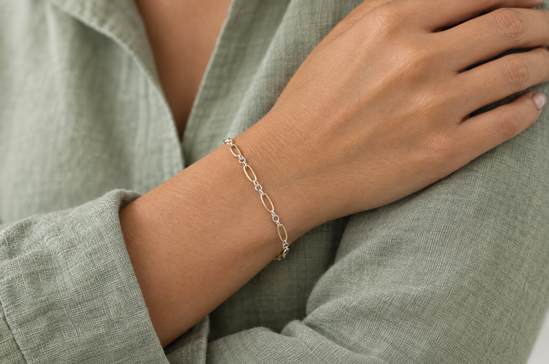 Load image into Gallery viewer, Adel mixed metal chain, 14K gold filled ovals and sterling silver links, worn as a welded permanent bracelet

