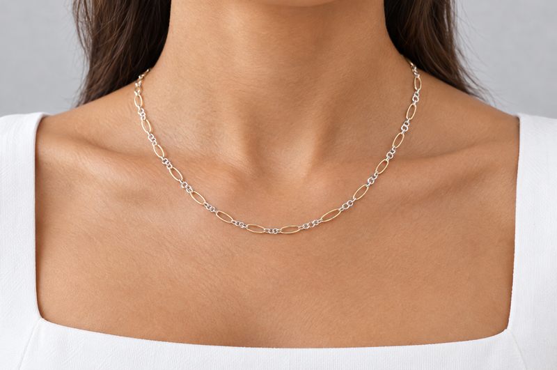 Load image into Gallery viewer, Adel mixed metal chain, 14K gold filled ovals and sterling silver links, worn as a permanent necklace
