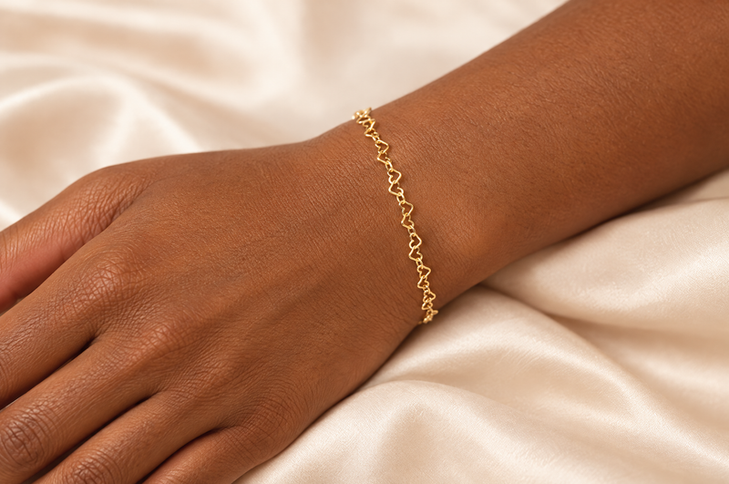 Load image into Gallery viewer, Love You More 14K gold filled heart link chain worn as a welded permanent bracelet
