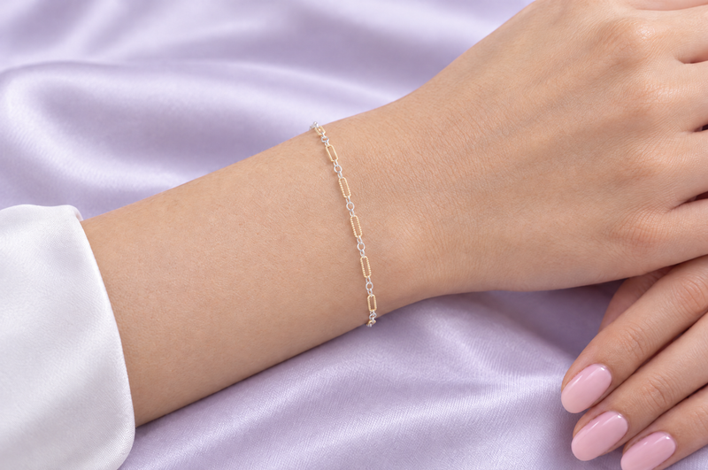 Load image into Gallery viewer, Luciana mixed metal chain, 14K gold filled textured paperclip and sterling silver links, worn as a welded permanent bracelet

