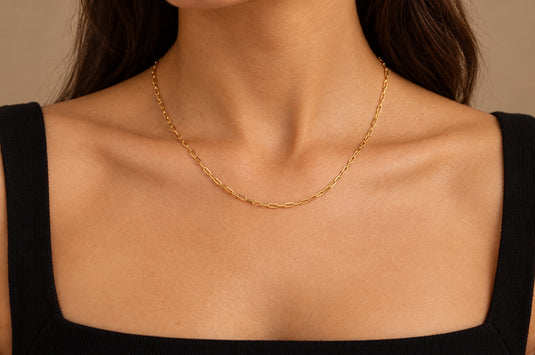 Monica 2.5mm gold PVD stainless steel paperclip chain worn as a permanent necklace