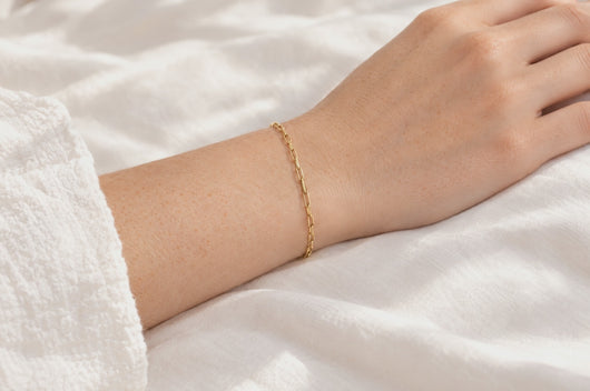 Monica 2.5mm gold PVD stainless steel paperclip chain worn as a welded permanent bracelet, video