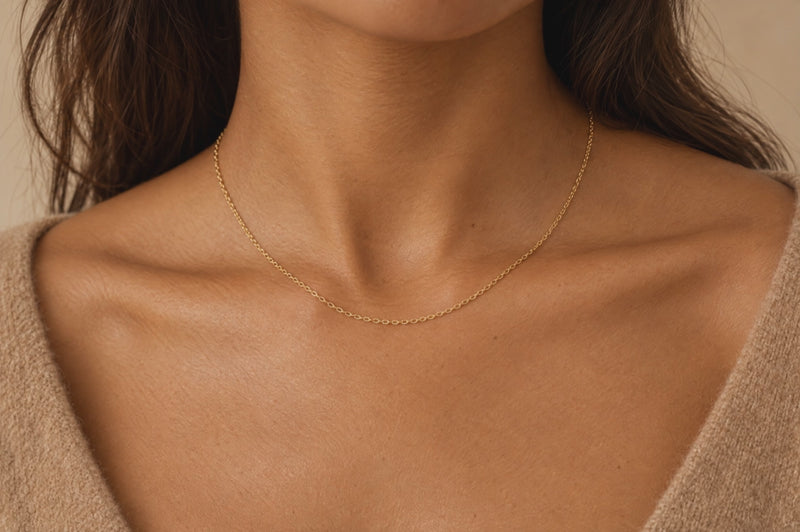 Load and play video in Gallery viewer, Sol 1.5mm gold PVD stainless steel oval cable chain worn as a permanent necklace, video
