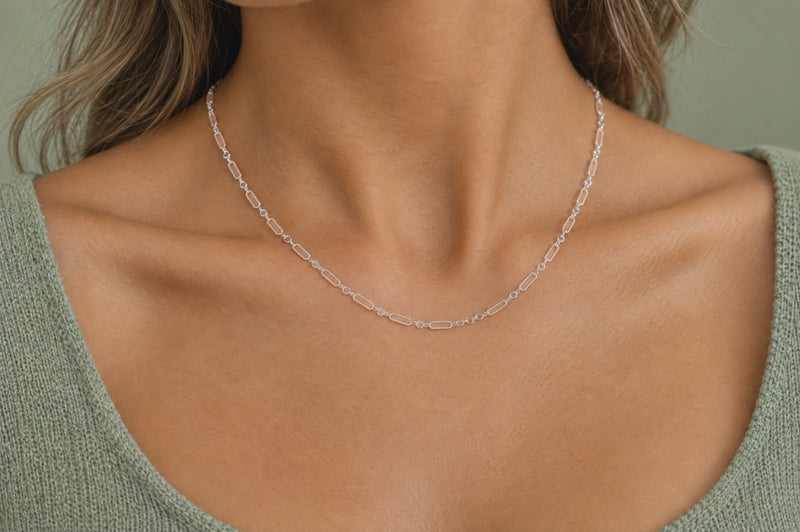 Load and play video in Gallery viewer, Luciana mixed metal chain, 14K gold filled textured paperclip and sterling silver links, worn as a permanent necklace, video
