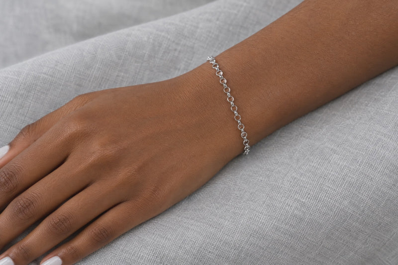 Load and play video in Gallery viewer, Zara 3mm silver-tone stainless steel cable chain worn as a welded permanent bracelet, video
