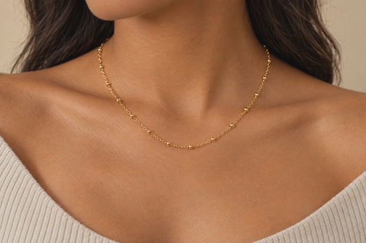 Elee 2.5mm gold PVD stainless steel beaded satellite chain worn as a permanent necklace, video